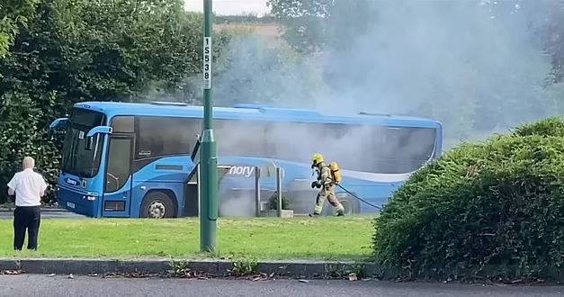 School bus packed with twenty children burst into flames 